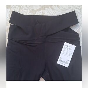 Athleta NWT Salutation Stash Wrap Tight Black Size Medium